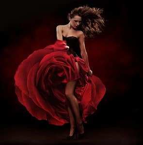 Beautiful dancer wearing red dress